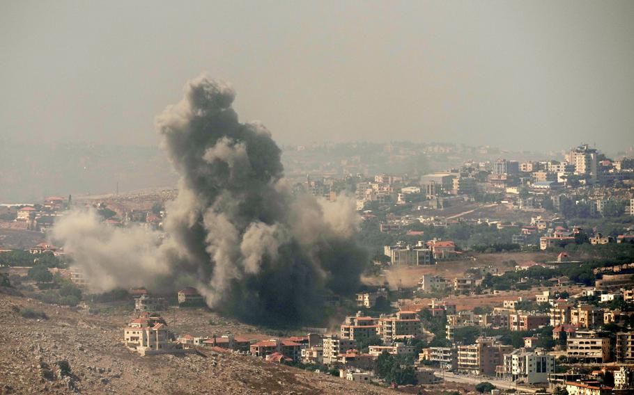 Smoke rises from an Israeli airstrike in the south Lebanon village of Kfar Rouman