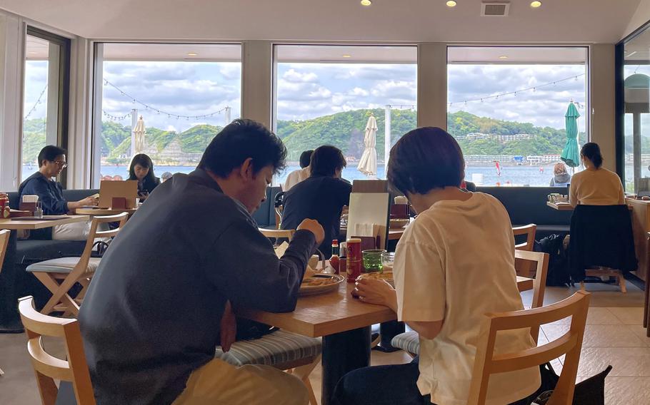 Nagisa Bashi Cafe provides the perfect pit stop for beachgoers seeking sustenance and relaxation before a day at Zushi Beach in Japan.