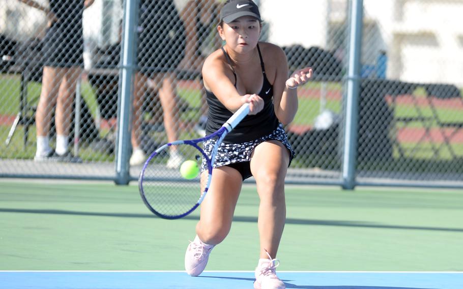 Chloe Lee hits the ball.