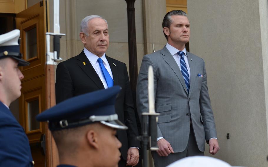 Israeli Prime Minister Benjamin Netanyahu and U.S. Defense Secretary Pete Hegseth renders honor