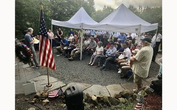 A large crown, including the elderly to toddlers, packed the memorial site on Mount Tom to remember the 25 men killed in 1946 when  B-17 crashed into the side of the mountain.