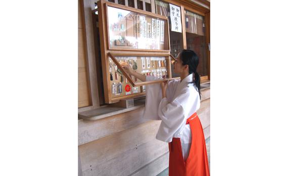 HED: Good luck for the New Year, 2007

Ginowan, Okinawa, Japan, Dec. 26, 2007: Yuka Tatetsu, one of the six Mikos, or shrine attendants at the  Futenma Shrine in Ginowan, near Camp Foster, makes one last check of sample charms and talismans displayed at the shrine office. 

Thousands of good luck charms are sold during the New Year Festival at the shrine. 

META TAGS: New Year; Shinto shrine; Okinawa; Japanese tradition; culture; religion