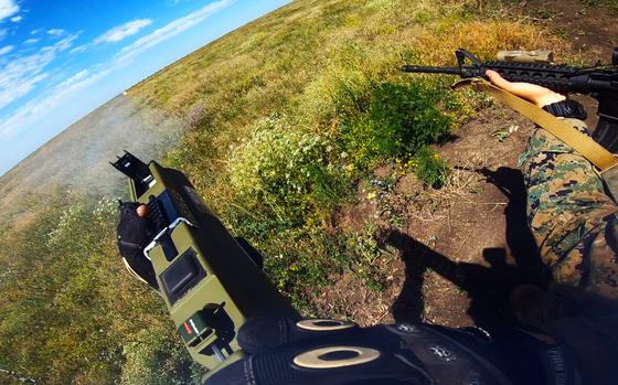 HED: Hitting the target, 2018

Mykolaiv region, Ukraine, July 14, 2018: Lance Cpl. Dwight Weatherford, an assaultman with the Marines 2nd Battalion, 25th Marine Regiment, fires a LAW rocket at a target while training with Ukrainian Marines during Exercise Sea Breeze. 

Read the article on Exercise Sea Breeze and see additional photos here. https://www.stripes.com/theaters/europe/2018-07-15/ukrainian-troops-keep-russia-on-their-minds-as-they-train-with-us-marines-1508901.html1

META TAGS: Ukraine; Russia; war in Ukraine; training; exercise; multi-national; 