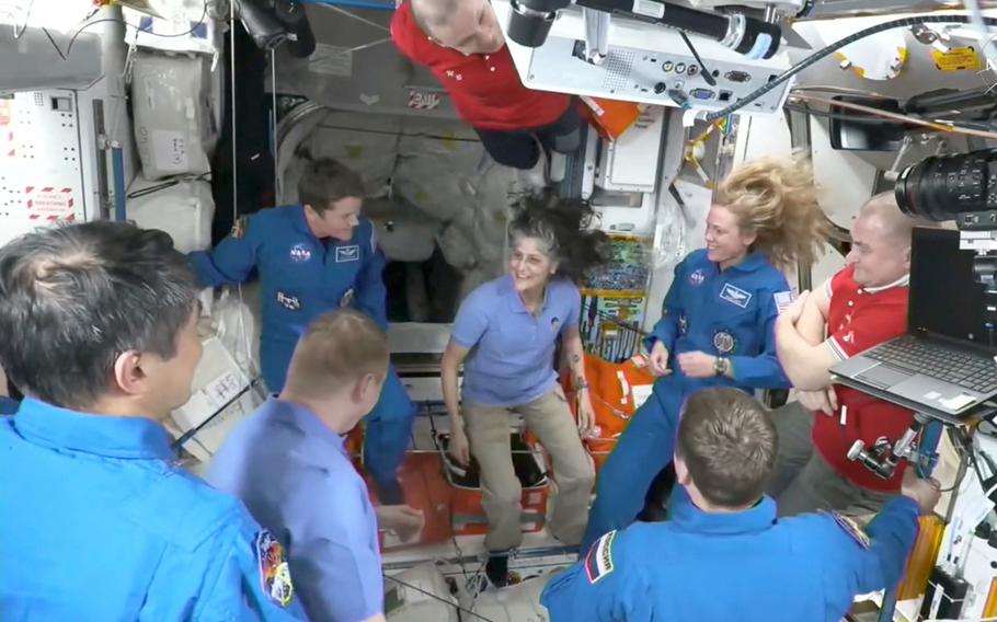 Suni Williams’ hair flows upward in the SpaceX capsule due to lack of gravity as she talks to other astronauts. 