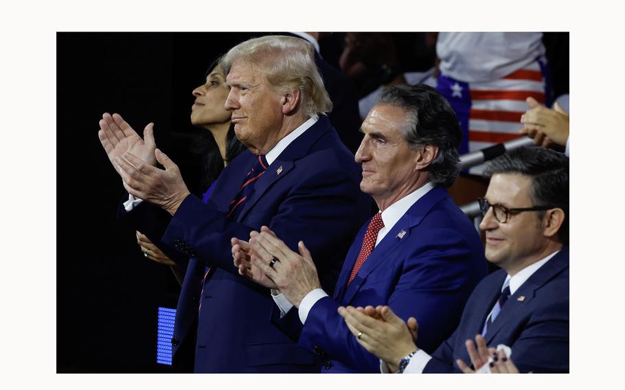 From left, Usha Chilukuri Vance, wife of J.D. Vance, Republican presidential candidate former President Donald Trump, N.D. Gov. Doug Burgum, and Speaker of the House Mike Johnson applaud on the third day of the Republican National Convention at the Fiserv Forum on July 17, 2024, in Milwaukee. 