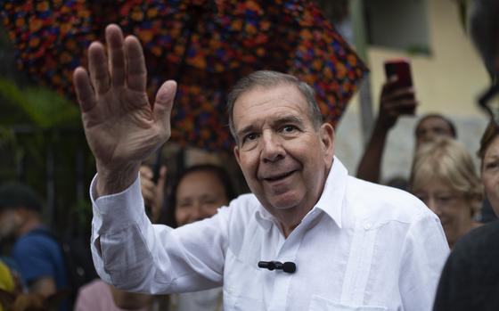 FILE - Venezuelan opposition presidential candidate Edmundo Gonzalez waves to supporters during a political event at a square in the Hatillo municipality of Caracas, Venezuela, June 19, 2024. (AP Photo/Ariana Cubillos, File)