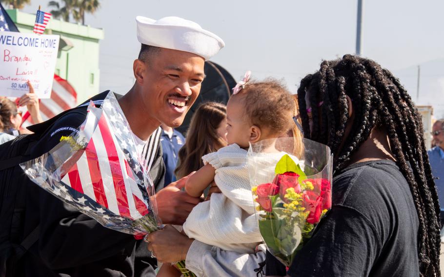 A sailor reunites with loved ones