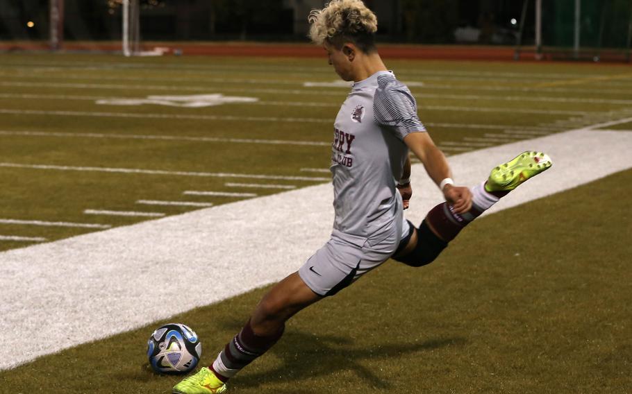 Ren Spinosi boots the ball away.