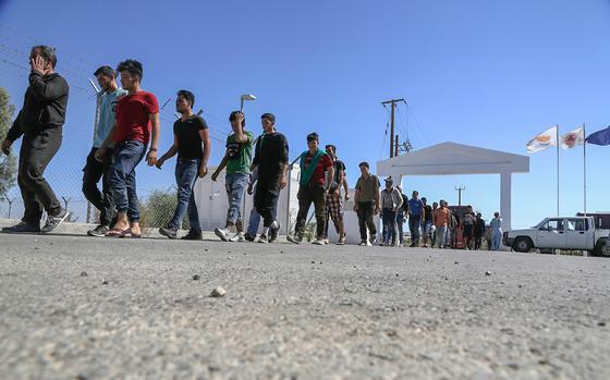 Migrants from Syria walk towards a refugee camp outside Nicosia, Cyprus, on Sept. 10, 2017. Cyprus’ President Nikos Christodoulides said on April 2, 2024, he has asked the head of the EU’s executive arm to intercede with Lebanese authorities to put a stop to boat loads of Syrian refugees heading to Cyprus from Lebanon.