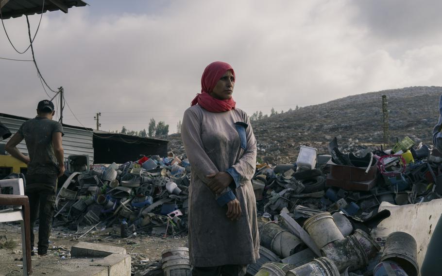 Amoon Gadra, a Syrian who works sorting plastic waste across from the building that was hit in Nabatiyeh, says she expects the violence in Lebanon to intensify. 