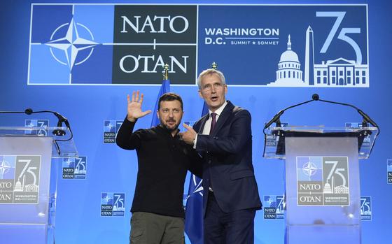 Ukraine's President Volodymyr Zelenskyy and NATO Secretary General Jens Stoltenberg speak during a press conference at the NATO summit in Washington, Thursday, July 11, 2024. (AP Photo/Mark Schiefelbein)