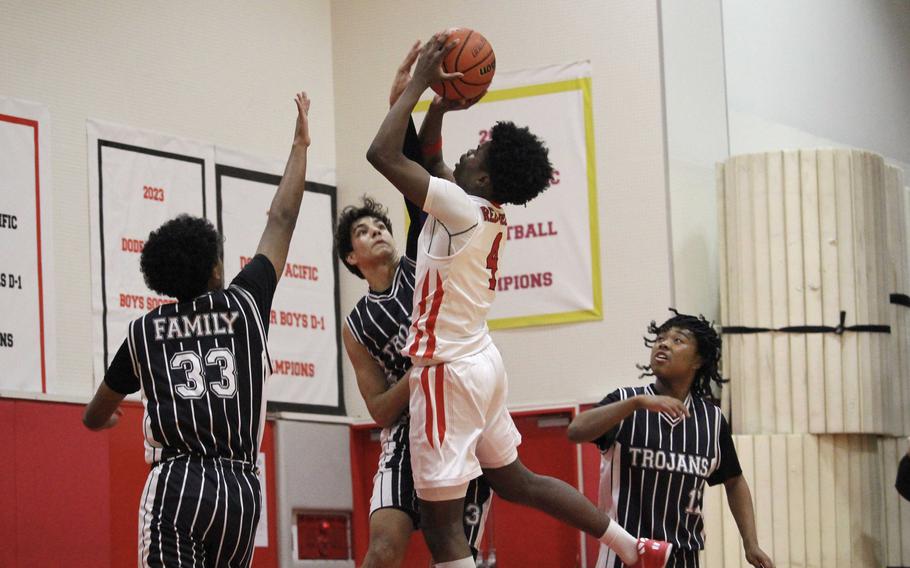 Elijah Mosley puts up a shot.