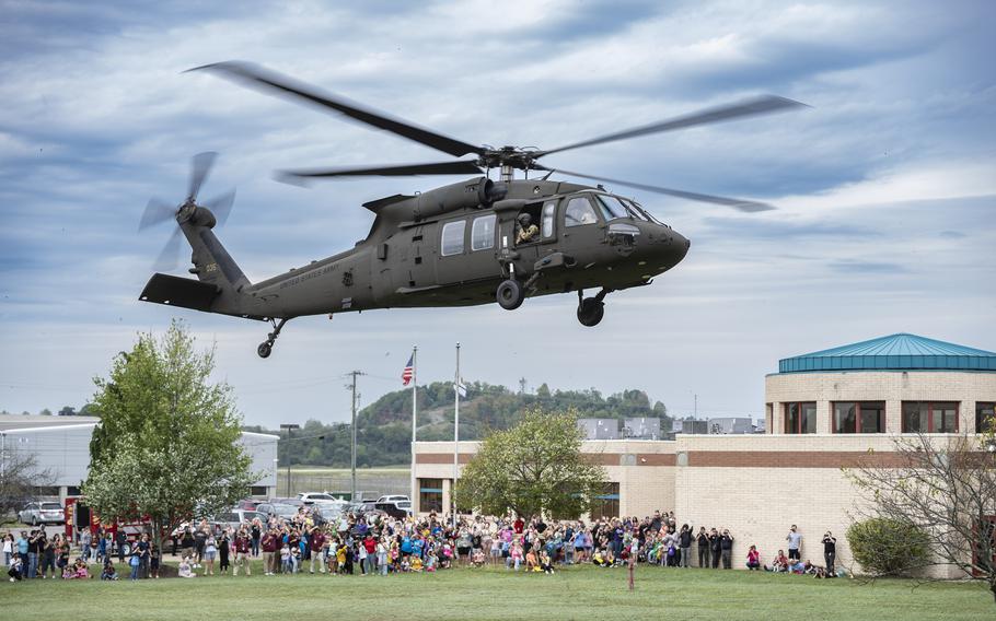 An all-women air crew from the West Virginia National Guard prepares to land a UH-60M Blackhawk helicopter.