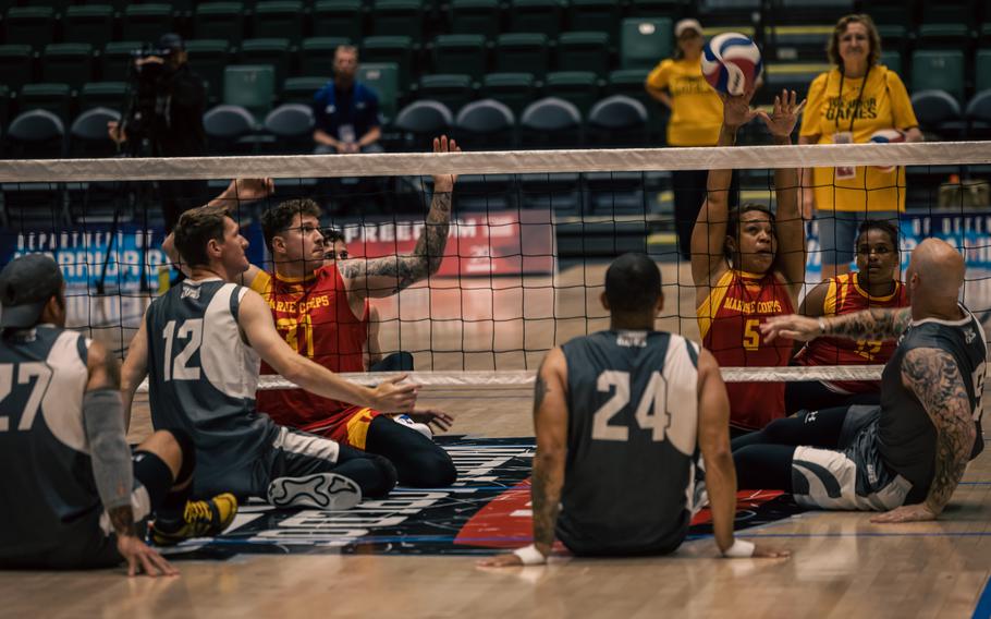 Athletes with Team Marine Corps and Team Special Operations Command compete in the sitting volleyball competition during the 2024 DOD Warrior Games Challenge at ESPN’s Wide World of Sports Complex in Orlando, Fla., June 30, 2024. 