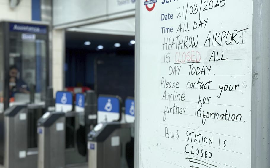 A handwritten sign at a Heathrow Airport tube station in London indicates the airport is closed.