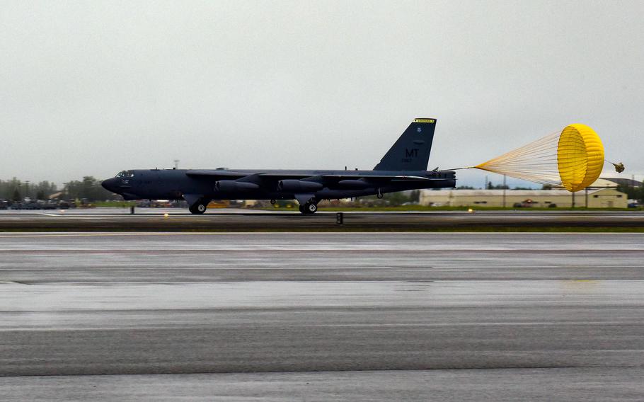 A drogue parachute helps a B-52H Stratofortress slow down upon landing at Joint Base Elmendorf-Richardson, Alaska, July 17, 2023.