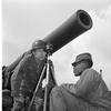 Sergeant First Class Freeman Tuberville, who serves with the 760th Field Artillery Battalion, B Battery, measures the firing range for the cannon behind him, assisted by an unknown Black soldier.

Looking for Stars and Stripes’ historic coverage? Subscribe to Stars and Stripes’ historic newspaper archive! We have digitized our 1948-1999 European and Pacific editions, as well as several of our WWII editions and made them available online through https://starsandstripes.newspaperarchive.com/

META TAGS: Army; Air Force; military family; way of life; military life; artillery; African-American; firing range; cannon