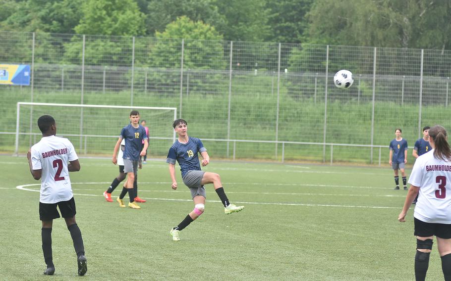 Ansbach’s Nathan Arrequin tries a shot from long distance in the Cougars’ 6-0 victory over Baumholder on Tuesday, May 21, 2024, that booked them a spot in Wednesday’s semifinals at the DODEA European Division III boys soccer championships.