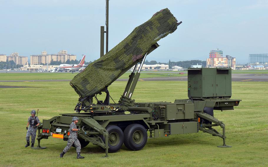 Japanese soldiers set up a Patriot missile defense battery during a demonstration at Yokota Air Base, Japan, in August 2017.