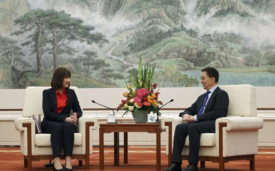 Britain's Chancellor of the Exchequer Rachel Reeves and Chinese Vice President Han Zheng attend a meeting at the Great Hall of the People in Beijing, Saturday, Jan. 11, 2025. (Florence Lo/Pool Photo via AP)