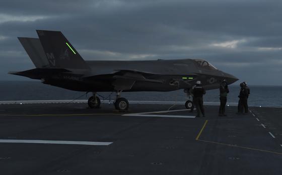 220119-N-XN177-1022 PACIFIC OCEAN (Jan. 19, 2022) -- An F-35B Lightning II attached to Marine Operational Test and Evaluation Squadron (VMX) 1 idles on the flight deck of amphibious assault ship USS Tripoli (LHA 7) during night flight operations Jan, 19. Tripoli is underway conducting routine operations in U.S. 3rd Fleet. (U.S. Navy photo by Mass Communication Specialist 1st Class Peter Burghart)