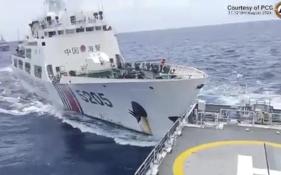 In this image taken from handout video provided by the Philippine Coast Guard, a Chinese Coast Guard ship with bow number 5205, right, collides with Philippine Coast Guard vessel BRP Teresa Magbanua near the Sabina Shoal at the disputed South China Sea on Saturday Aug. 31, 2024. (Philippine Coast Guard via AP)