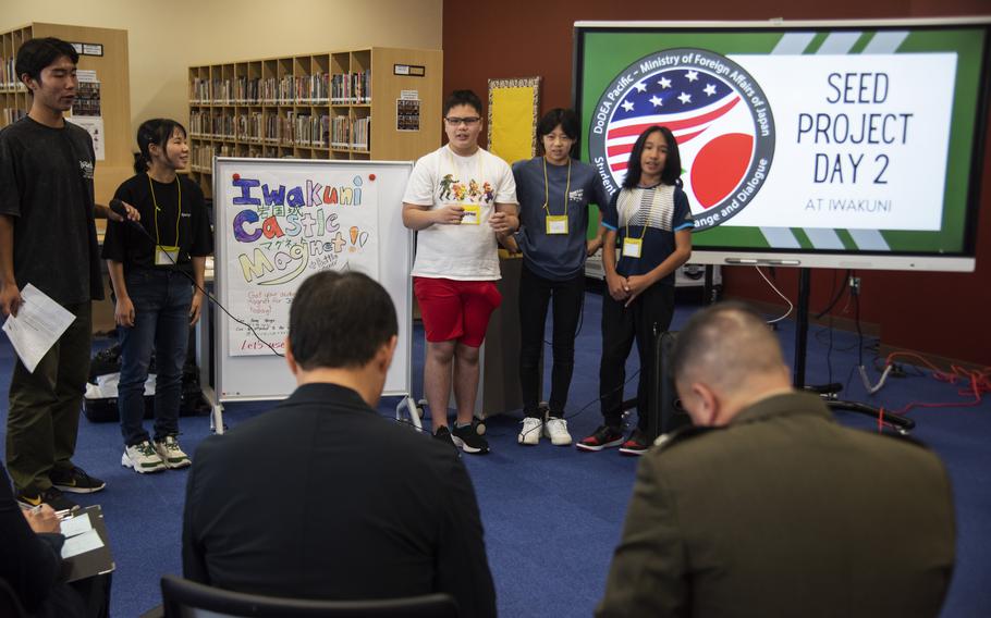 American and Japanese students make their presentation before Col. Richard Rusnok and Iwakuni city Mayor Yoshihiko Fukuda during the Student Educational Exchange and Dialogue at Matthew C. Perry High School, Marine Corps Air Station Iwakuni, Japan, Sept. 8, 2024. 