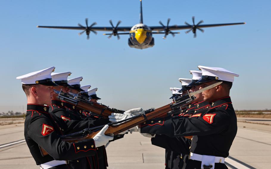 U.S. Marines with the Silent Drill Platoon execute a drill sequence