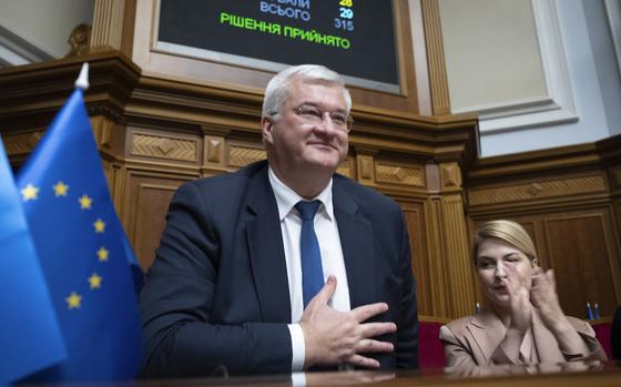 In this photo provided by the Ukrainian Parliament Press Office, Ukraine's newly appointed Foreign Minister Andrii Sybiha speaks in parliament in Kyiv, Ukraine, Thursday, Sept. 5, 2024. (Andrii Nesterewnko/Ukrainian Parliament Press Office via AP)