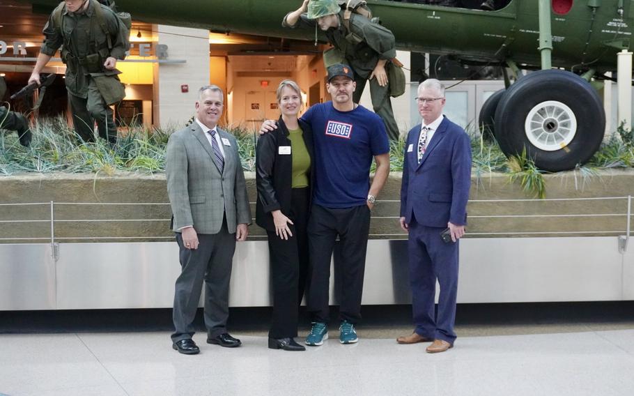 SEAL Team actor David Boreanaz poses for a photo with staff