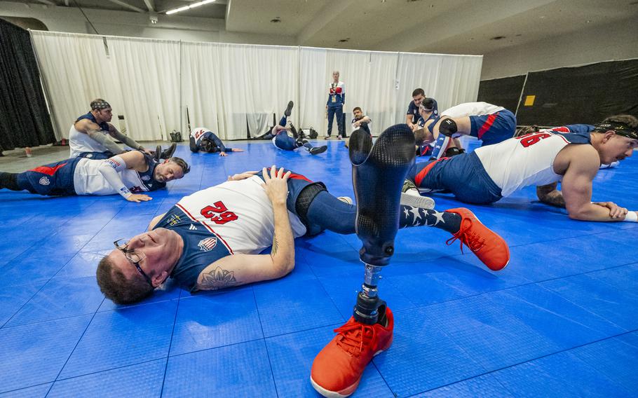 A competitor stretches before a match