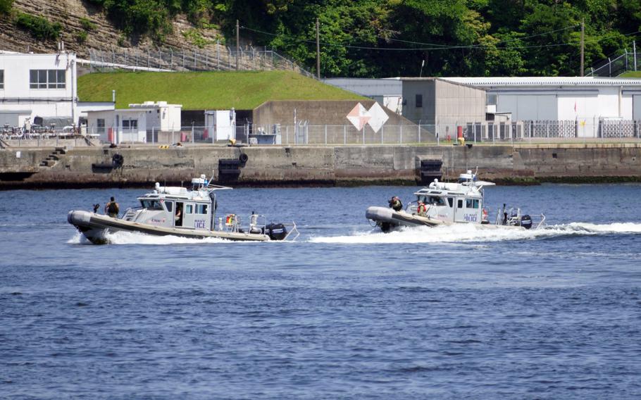 U.S. Navy security teams race through Truman Bay during a harbor security exercise near Yokosuka Naval Base, Japan, June 5, 2024. 