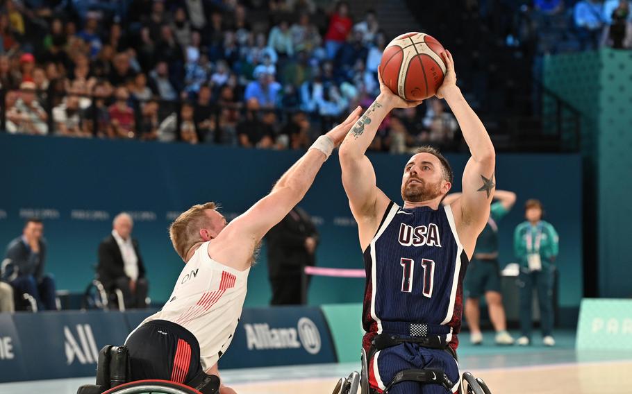 Steve Serio shoots over a Great Britain defender in the wheelchair basketball championship game at the 2024 Paris Paralympics, Sept. 7, 2024. The U.S. took the gold with a 73-69 win.