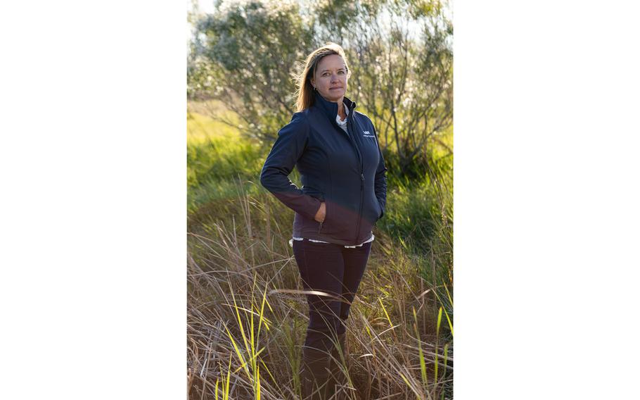 Dawn York, a senior coastal planner at the engineering firm Moffatt & Nichol, photographed in Wilmington, N.C., in November 2023. York is working on plans for elevating the Battleship North Carolina’s parking lot and re-naturalizing the flooded portion into a marsh with a tidal creek that will absorb typical tidal floodwaters.