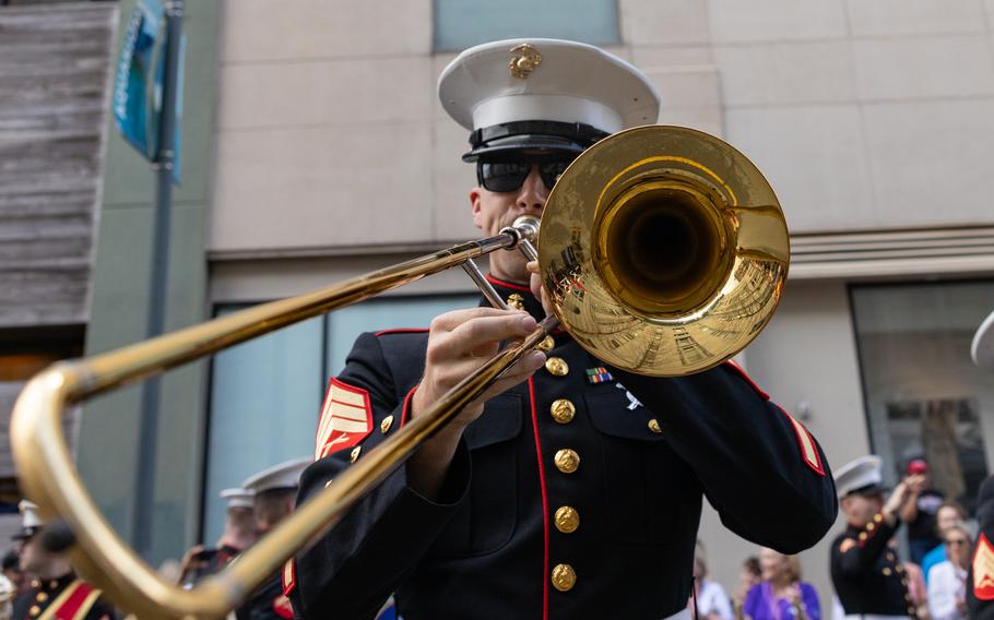 A Marine performs at the Super Bowl LIX parade