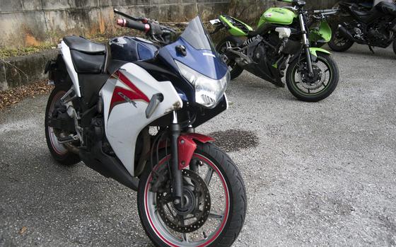 These motorcycles, parked at Ishikawa Police Station in Uruma, Okinawa, Nov. 20, 2024, were involved in a fatal collision the previous day in Kin town.