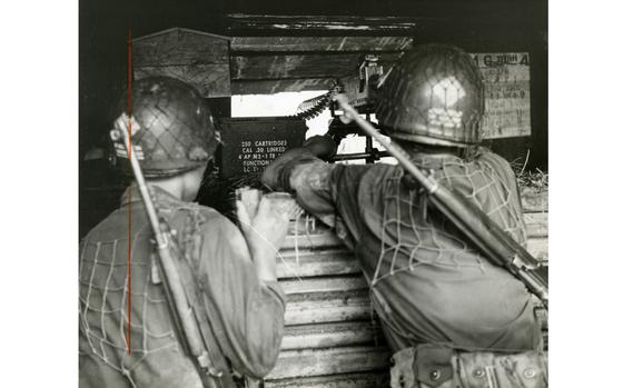 Demilitarized Zone, South Korea, Aug. 1960: Soldiers of the 1st Republic of Korea Division keep their machine gun ready for any threats against their outpost on the Demilitarized Zone. The ROK division soldiers man the DMZ year round and dread the annual summer deluge of rain when mud makes the narrow roads that lead to their position impassible even for emergency use. Stocked up with a month-worth of food, the soldiers wait out the rain, with helicopters standing by for aid in case of severe floods on other emergencies. 

Check out additional reporting on the rainy season on the DMZ here. 

Pictured here is a scan of the original 1960 print created by Stars and Stripes Pacific's photo department to run in the print newspaper. The red marks indicate the crop lines. Only the middle part of the image would appear in the newspaper. As the vast majority of pre-1964 Stars and Stripes Pacific negatives and slides were unwittingly destroyed by poor temporary storage in 1963, the prints developed from the late 1940s through 1963 are the only images left of Stripes' news photography from those decades – with the exception the negatives of some 190 pre-1964 photo assignment found recently. Stars and Stripes' archives team is scanning these prints and negatives to ensure their preservation. 


META TAGS: Pacific; South Korea; Demilitarized Zone; Republic of Korea Army; DMZ; 1st ROK Div