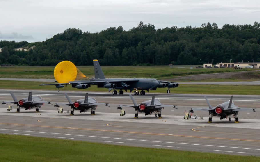 A B-52H Stratofortress deploys its drogue chute as it lands at Joint Base Elmendorf-Richardson, Alaska, July 11, 2023. 