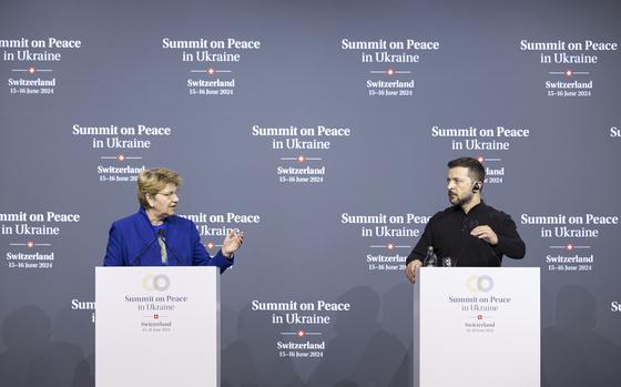 Ukrainian President Volodymyr Zelenskyy, right, and Swiss Federal President Viola Amherd during their press conference during the Summit on Peace in Ukraine, in Stansstad, Switzerland, Saturday June 15, 2024. Switzerland is hosting scores of world leaders this weekend to try to map out the first steps toward peace in Ukraine. (Michael Buholzer/Keystone via AP)