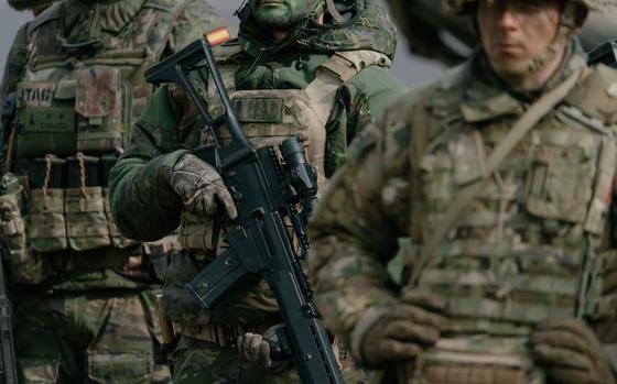 Spanish soldiers during a North Atlantic Treaty Organization's Allied Reaction Force training in Smardan, Romania, on Feb. 19. MUST CREDIT: Andrei Pungovschi/Bloomberg 