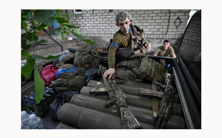 A mortar operator of the 47th Mechanised Brigade of Ukrainian Army prepares to go on a mission in Pokrovsk area, Donetsk region, on June 12, 2024, amid the Russian invasion of Ukraine. 