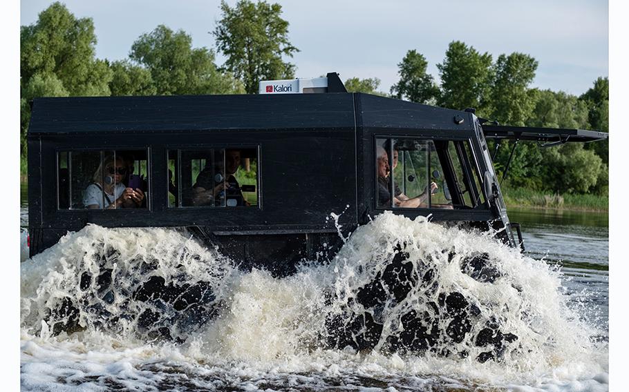 A Bohun-2 all-terrain vehicle makes its way over a lake during a demonstration on June 16, 2023.