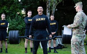 Army Sgt. Juan Loera-Rogers does a maximum weight deadlift during the U.S. Army Europe and Africa Best Warrior Competition at the Hohenfels Training Area, Germany, Aug. 7, 2021. The black-and-gold physical training uniform design will remain but the Army is looking at some new options for the clothing.