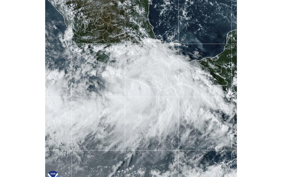 This National Oceanic and Atmospheric Administration satellite image taken at 6:10 p.m. ET shows Hurricane John near southern Mexico on Monday, Sept. 23, 2024. 