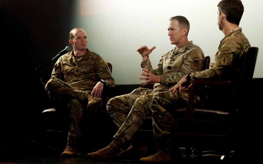 Col. Matthew Myer, center, and Chief Warrant Officer 2 John Hayes, right, share lessons learned from the Battle of Wanat with members of the 173rd Airborne Brigade in Vicenza, Italy, on July 1, 2024, in advance of their Saber Junction training. At left is Capt. Rob Koontz, who was moderating. 