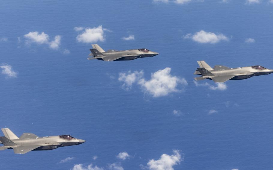 F-35 Lightning II advanced fighters fly in formation.