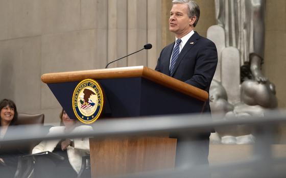 FBI Director Christopher Wray speaks during a farewell ceremony for Attorney General Merrick Garland at the Department of Justice, Thursday, Jan. 16, 2025, in Washington. (AP Photo/Mark Schiefelbein)