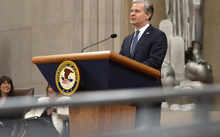 FBI Director Christopher Wray speaks during a farewell ceremony