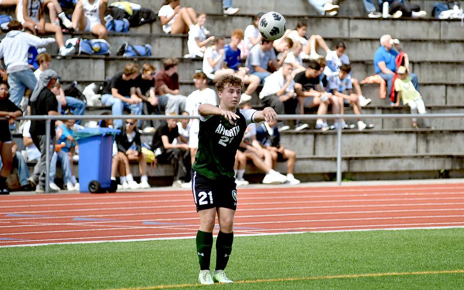 AFNORTH right back Nik Fulde throws in the ball during the Division III boys title match against Ansbach at the DODEA European championships on May 23, 2024, at Ramstein High School on Ramstein Air Base, Germany.