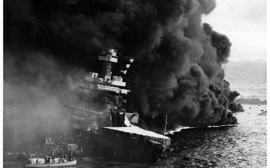 The crew abandons the damaged USS California on Dec. 7, 1941, at Pearl Harbor.